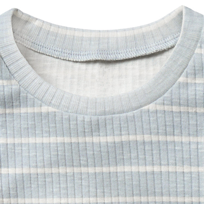 Close-up of a ribbed knit fabric with a collar