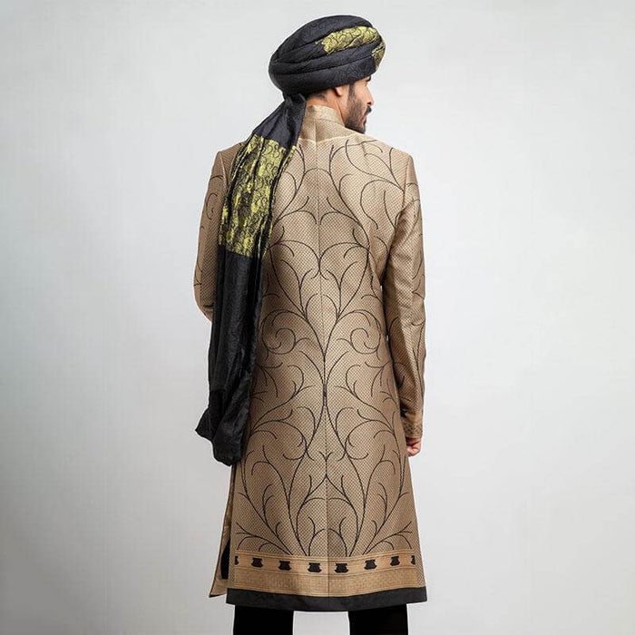 Antique gold and black brocade form-fitted sherwani with intricate embroidery, combining luxurious design and a modern tailored fit.