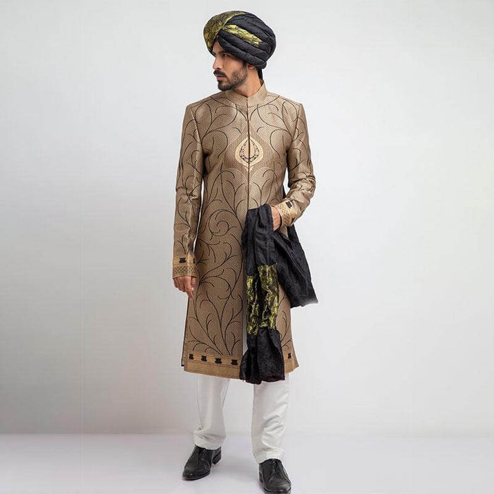 Antique gold and black brocade form-fitted sherwani with intricate embroidery, combining luxurious design and a modern tailored fit.