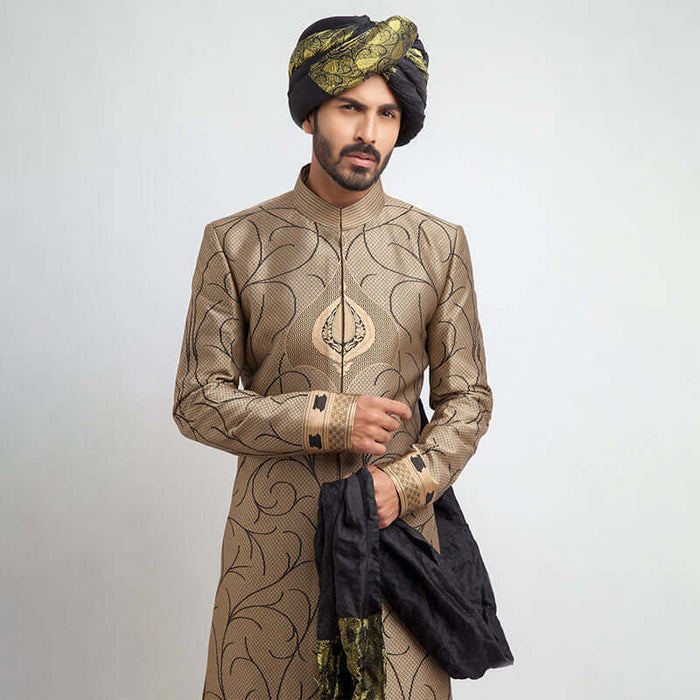 Antique gold and black brocade form-fitted sherwani with intricate embroidery, combining luxurious design and a modern tailored fit.