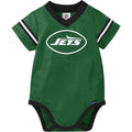 Green baby onesie with 'Jets' logo on a white background