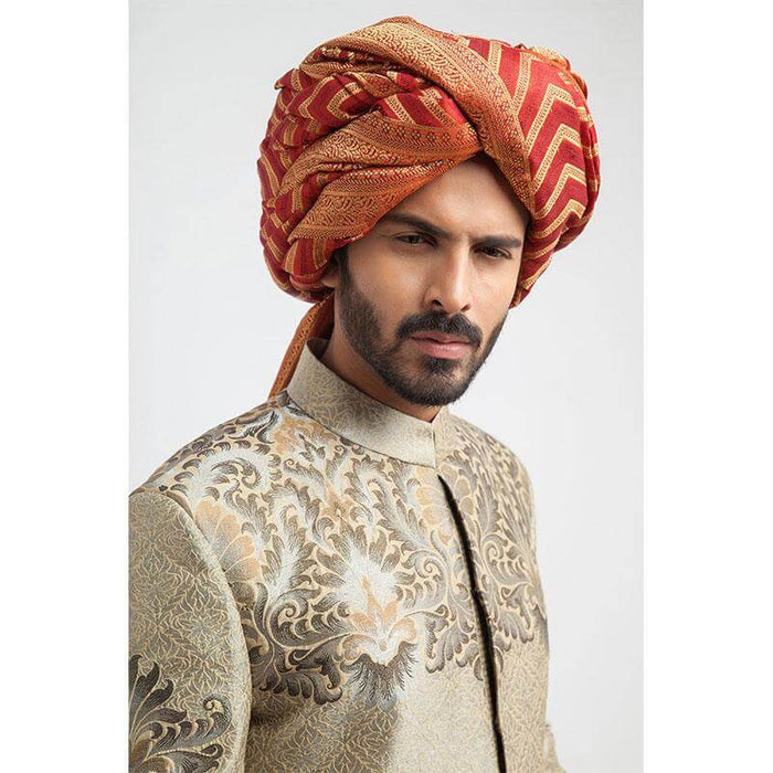 Ecru and grey brocade sherwani with a tailored fit, featuring intricate woven detailing for a regal, formal look.