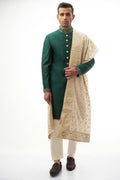 Emerald Green Brocade Silk Sherwani with Handcrafted Zardozi – Elegant and luxurious with intricate zardozi embroidery.