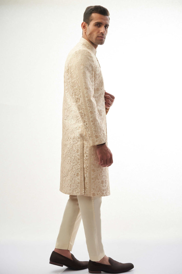 Fawn Persian Painting-Inspired Sherwani – Exquisite fawn-colored sherwani with intricate Persian painting-inspired embroidery for a royal look.