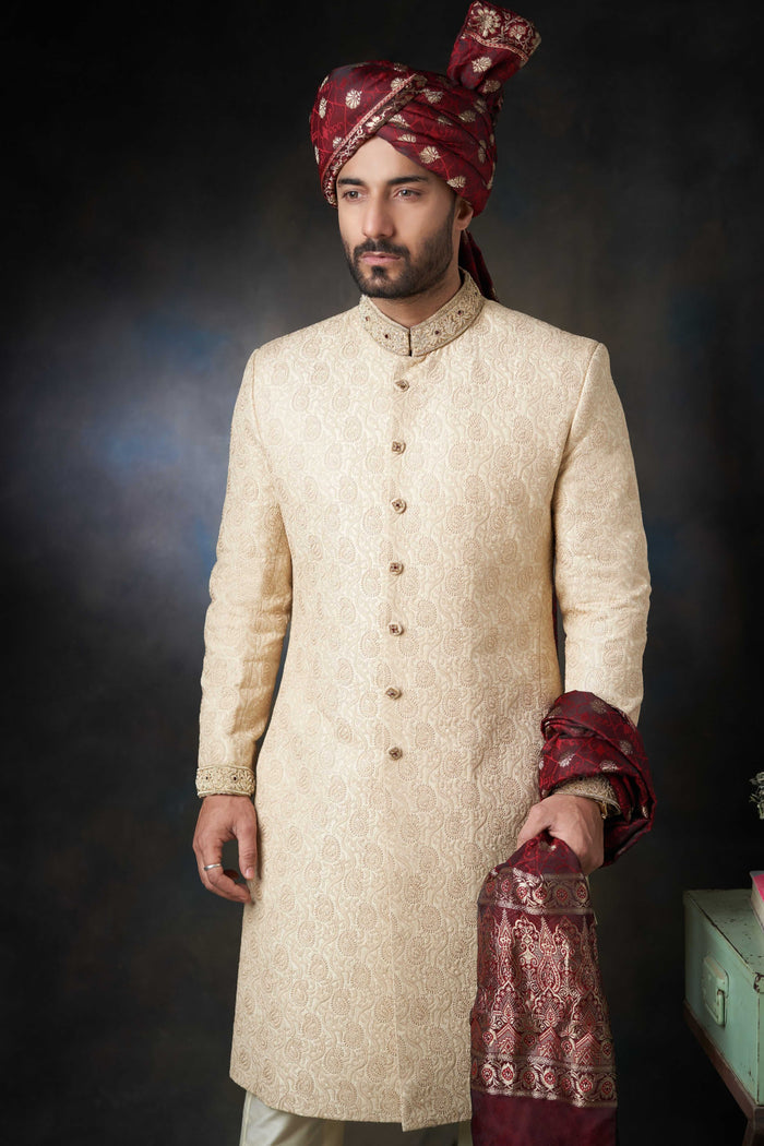 Gold Paisleys Rawsilk Sherwani with Velvet Shawl & Zardozi Adornments, Regal Wedding Attire.