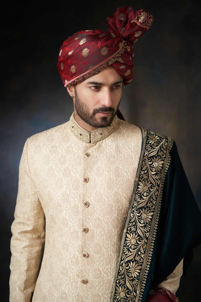 Gold Paisleys Rawsilk Sherwani with Velvet Shawl & Zardozi Adornments, Regal Wedding Attire.