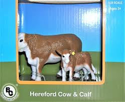 HERFORD COW AND CALF