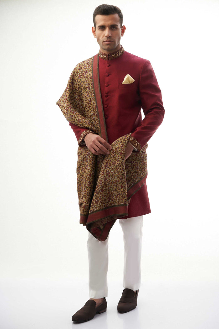 Maroon Brocade Silk Sherwani with Handcrafted Zardozi – Elegant maroon silk sherwani featuring intricate zardozi embroidery for a royal touch.