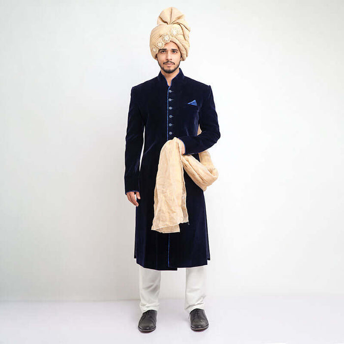 Elegant jet black cocktail sherwani in velvet with sleek form-fitted cut