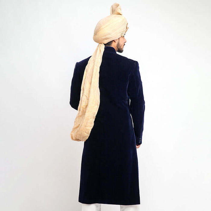 Elegant jet black cocktail sherwani in velvet with sleek form-fitted cut