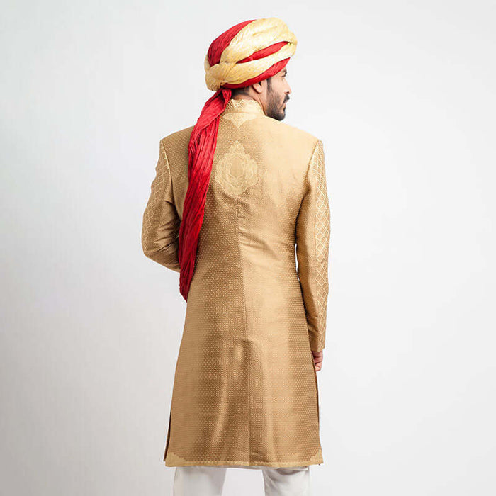 Peach Gold and Antique Gold Brocade Form-Fitted Sherwani with intricate detailing