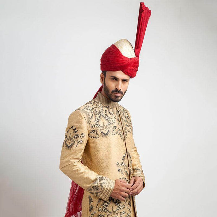 Exquisite Peach Gold and Grey Brocade Sherwani with detailed embroidery, perfect for a regal and sophisticated look at special occasions.