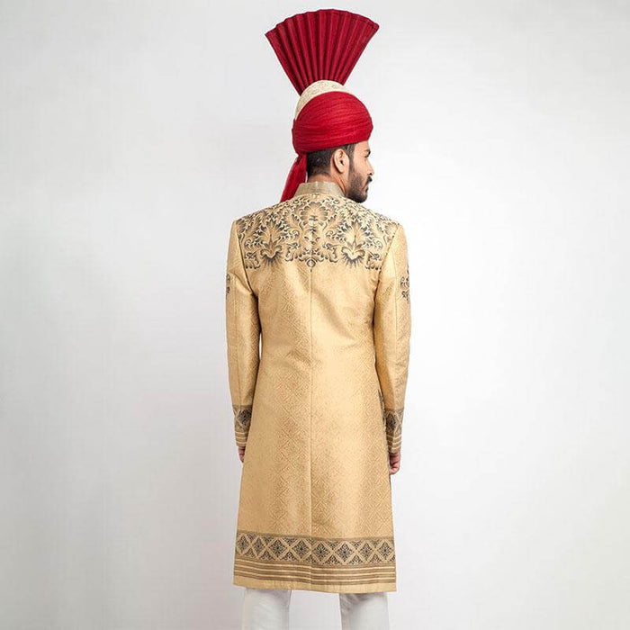 Exquisite Peach Gold and Grey Brocade Sherwani with detailed embroidery, perfect for a regal and sophisticated look at special occasions.