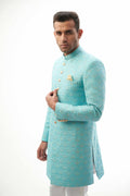 Sky Blue Rawsilk Sherwani with Resham and Gold Tilla Embroidery, Ideal for Weddings and Festive Occasions.