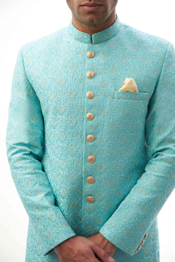Sky Blue Rawsilk Sherwani with Resham and Gold Tilla Embroidery, Ideal for Weddings and Festive Occasions.